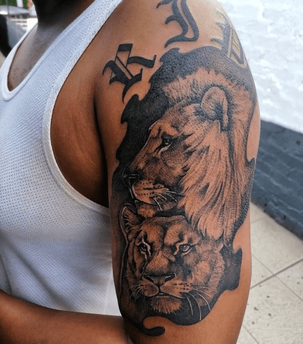 Lion tattoo on black skin